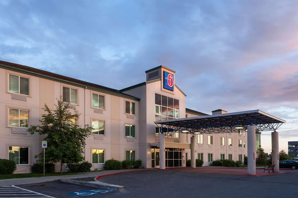 Property building, Facade/entrance, Property logo or sign, On site, Time of day, Sunset