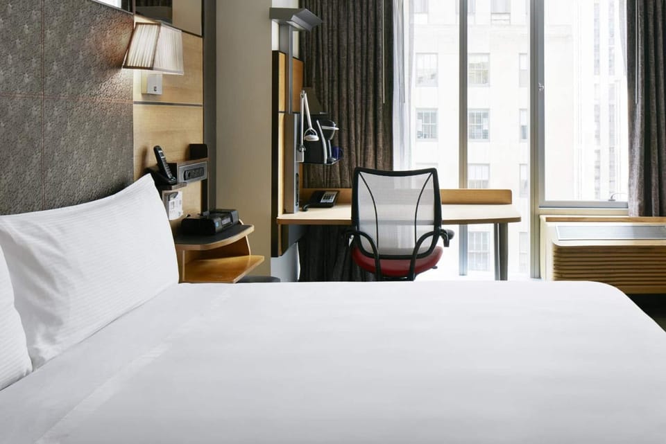 Bed, Seating area, Bedroom