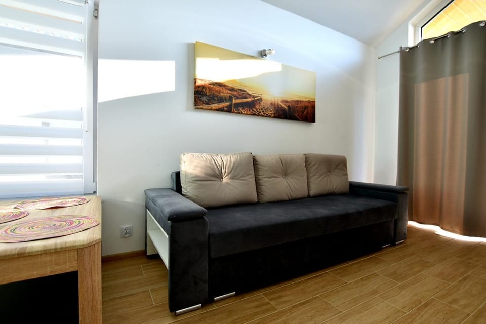 Domki na Rozanej Nature lodge in Pomeranian Voivodeship