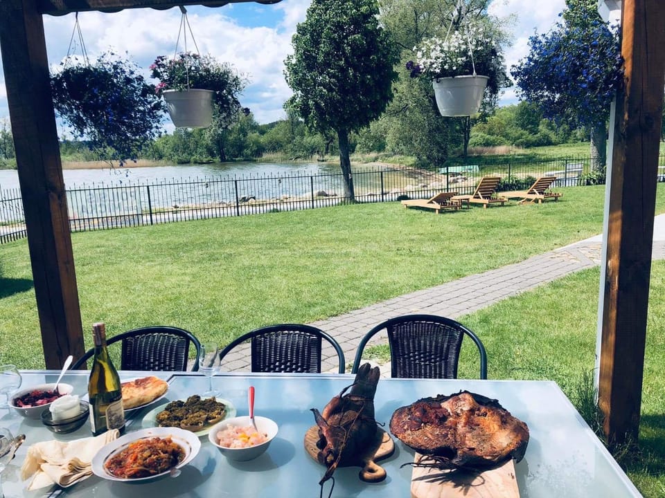 Natural landscape, Dining area, Food, Lake view, Dinner, Drinks