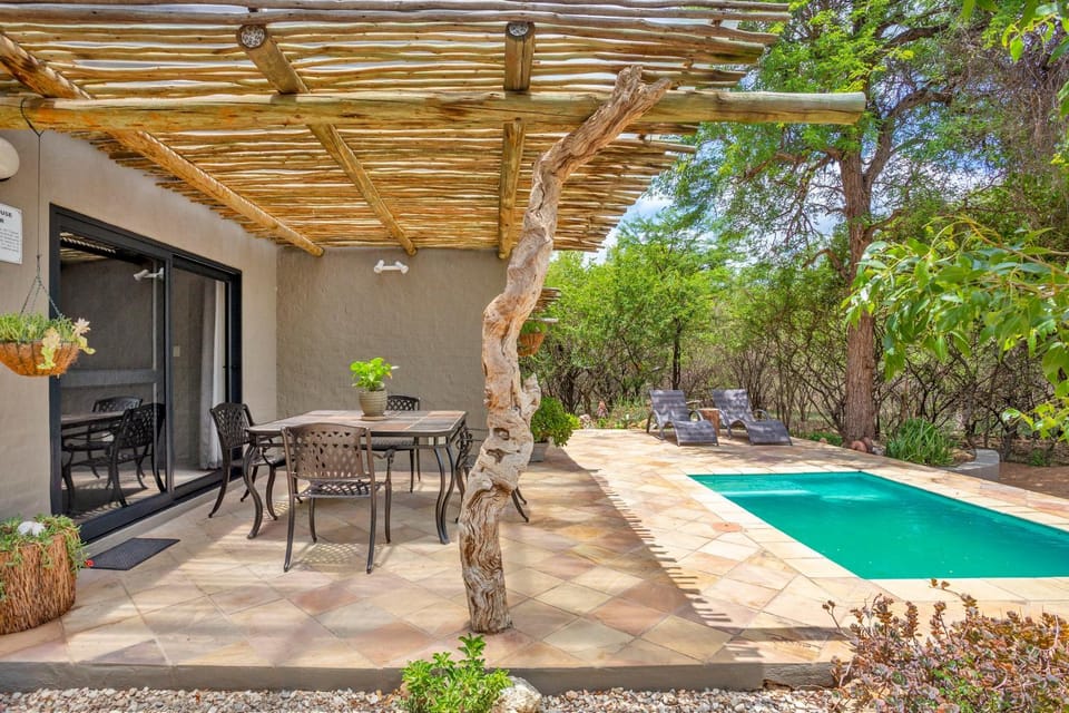 Property building, Patio, Spring, Day, Garden, Dining area, Garden view, Pool view, Swimming pool, sunbed