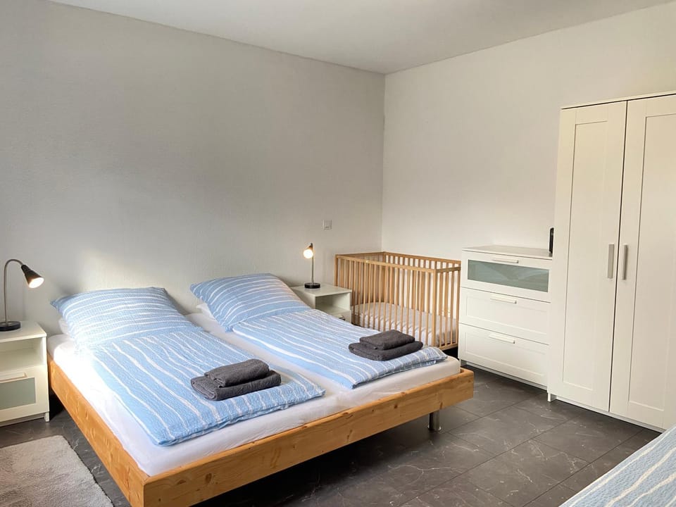 Bed, Photo of the whole room, Bedroom, cot, towels, wardrobe