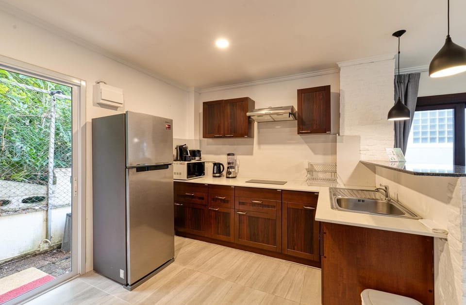 Kitchen or kitchenette, stove, toaster