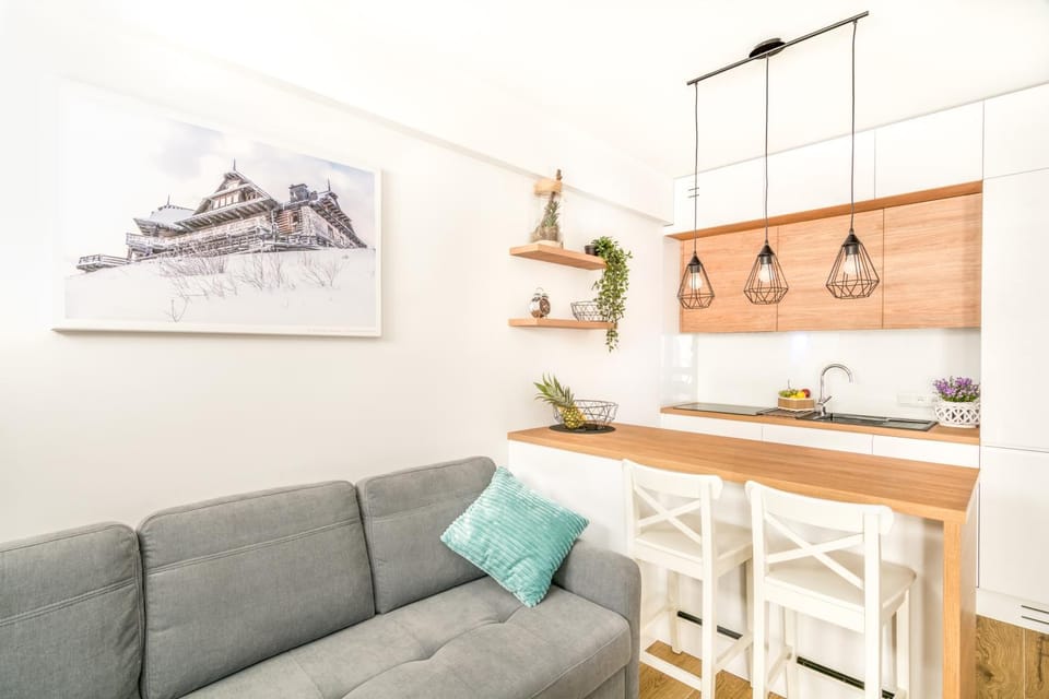 Kitchen or kitchenette, Living room, Seating area, Dining area