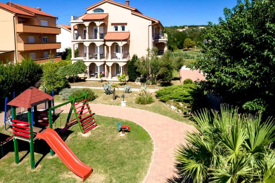 Property building, Children play ground, Garden