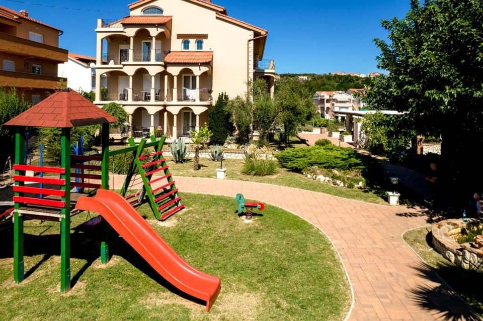 Property building, Children play ground, Garden