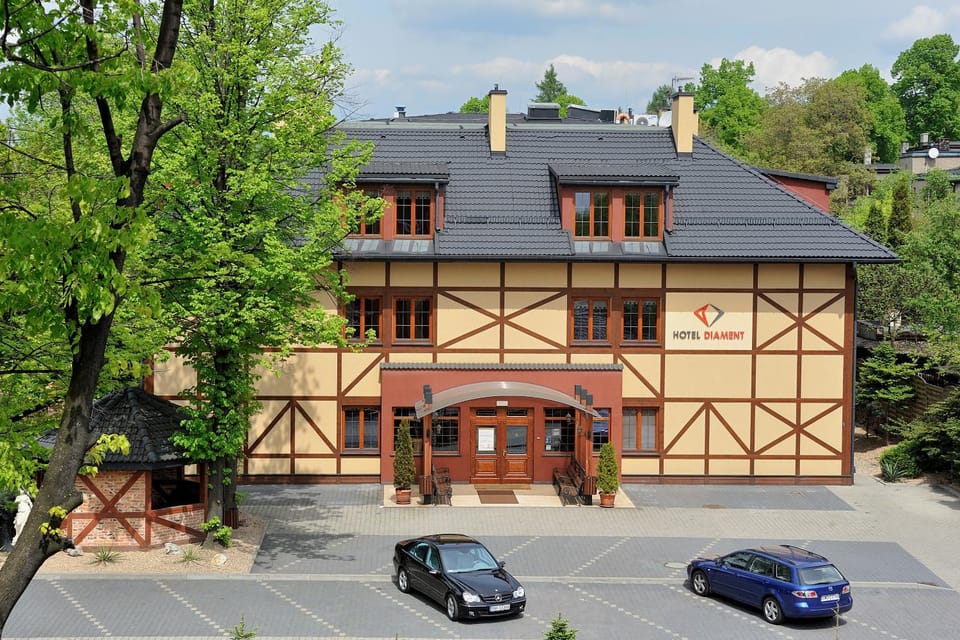 Property building, Facade/entrance, Day, Parking