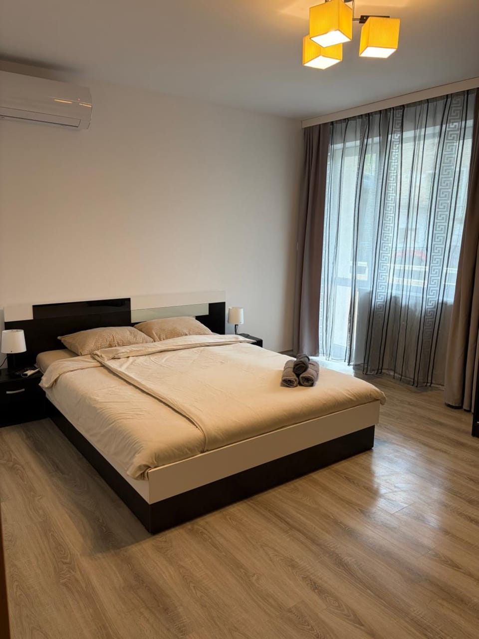 Bed, Photo of the whole room, Bedroom, towels, air conditioner