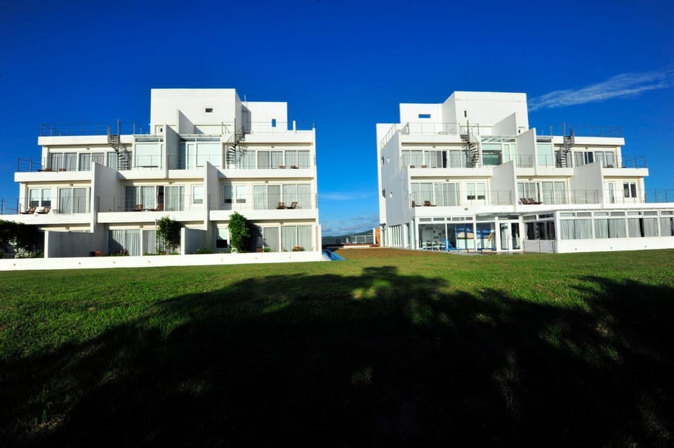 Property building, Day, Natural landscape, Balcony/Terrace, Sea view, Sunset