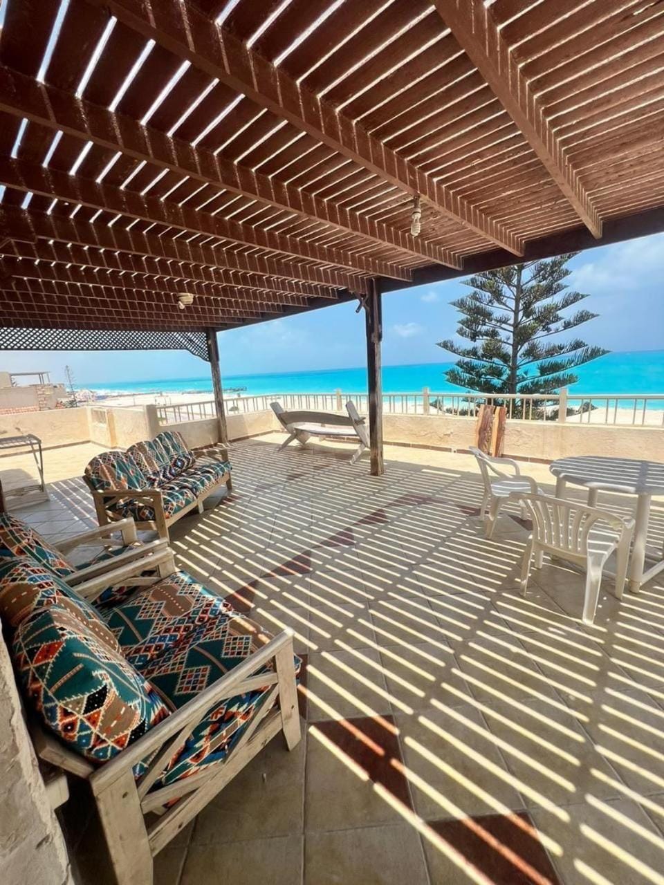 View (from property/room), Balcony/Terrace, Seating area, Beach
