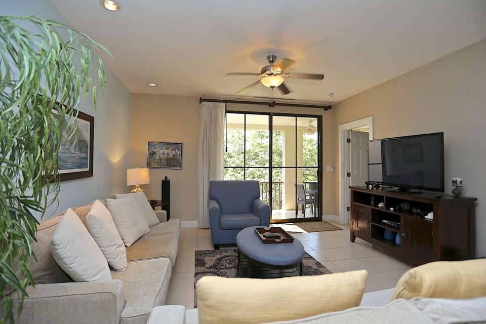 Coastal-Inspired Condo with a Pool-View Balcony & Beach Club Access Apartment in Coco