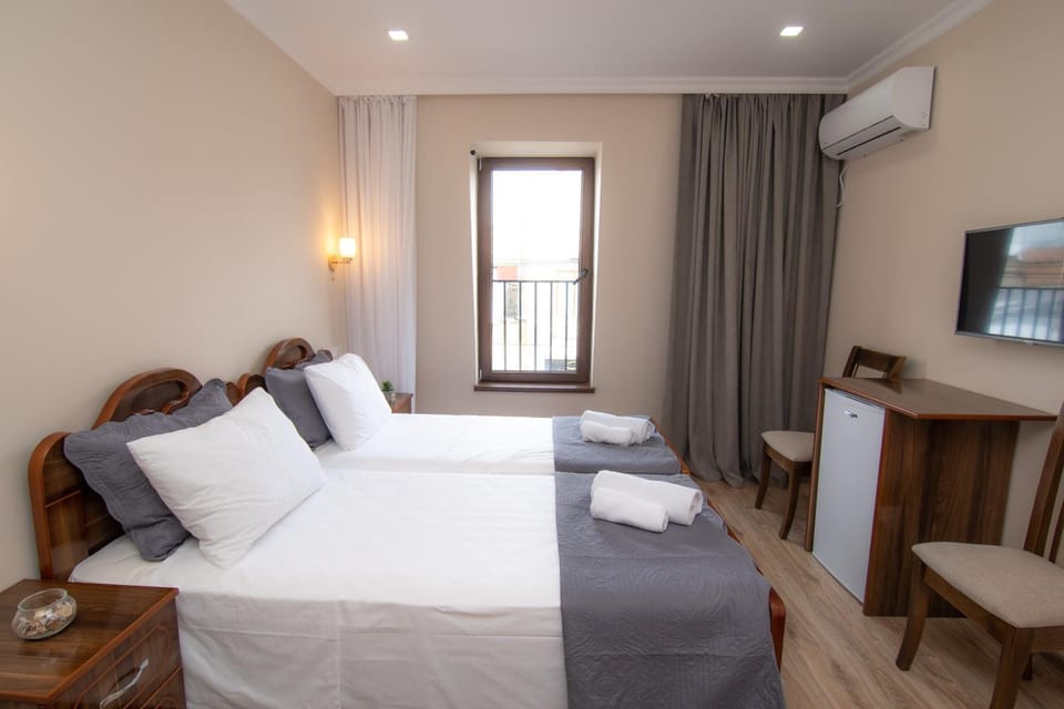 Bed, Photo of the whole room, Bedroom, towels, air conditioner