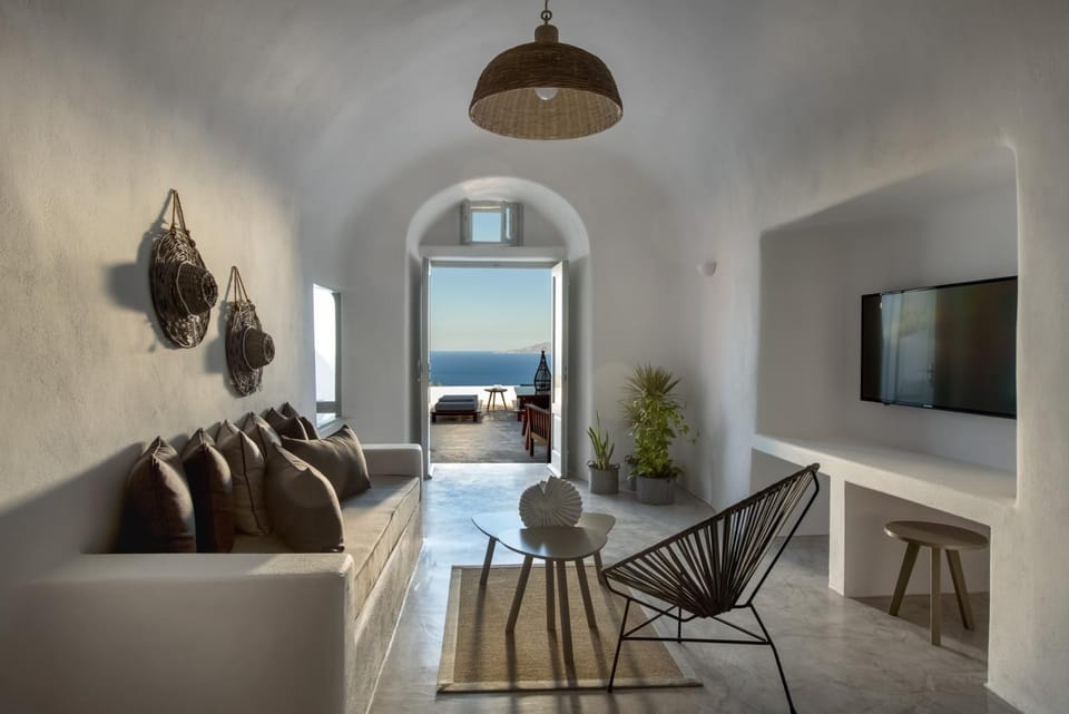 Bed, TV and multimedia, Living room, Seating area, Sea view