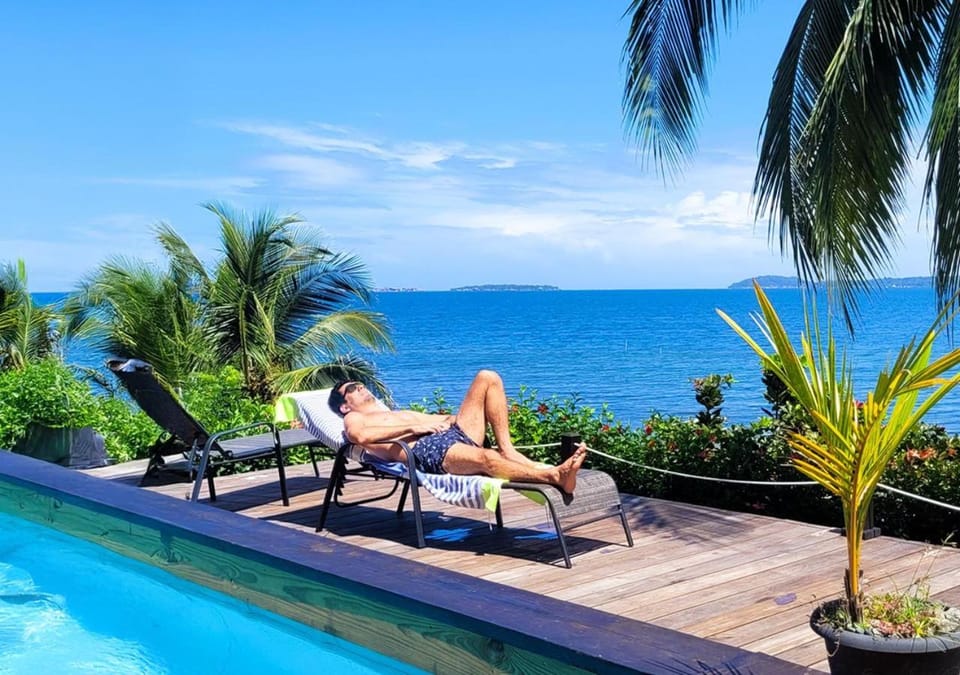 Property building, People, Sea view, Swimming pool, sunbed