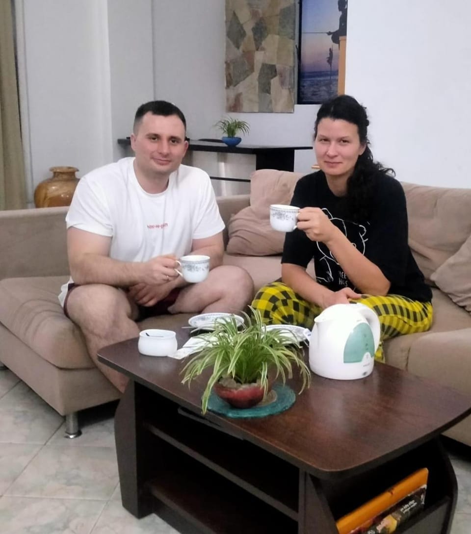 Living room, Food and drinks, Seating area, Guests, Drinks