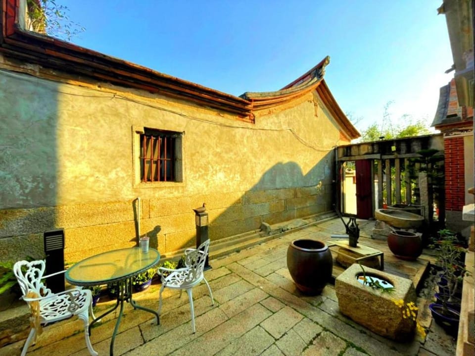 Property building, Patio, Day, Living room, Seating area, Dining area