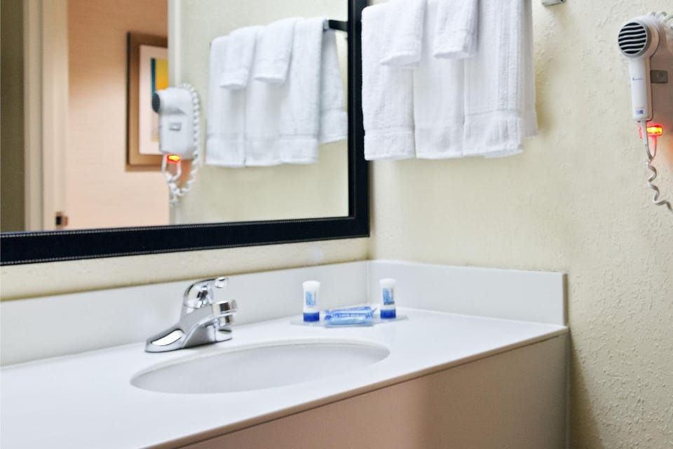 Bathroom, hair dryier, towels