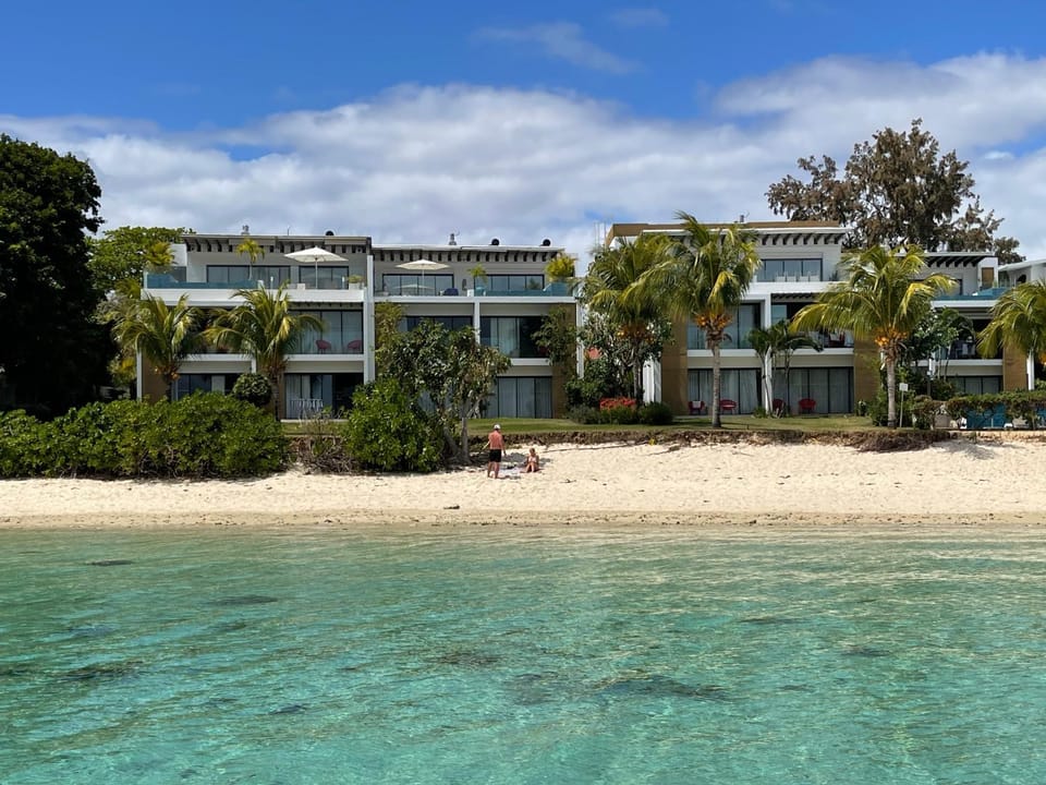 Property building, Day, Natural landscape, Beach, Sea view