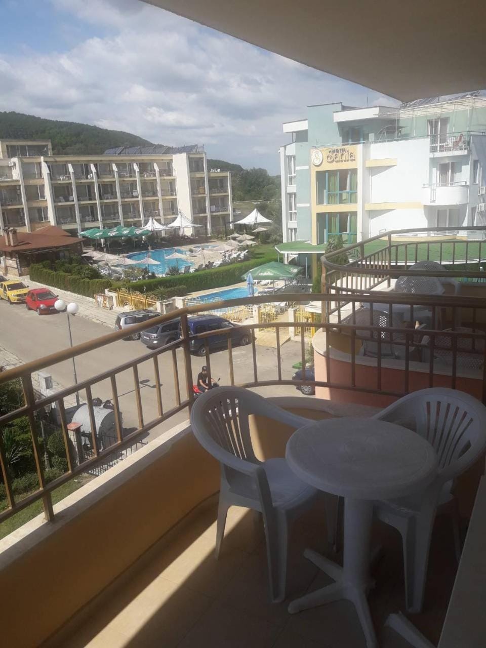 Property building, Day, View (from property/room), Balcony/Terrace, Seating area, Parking
