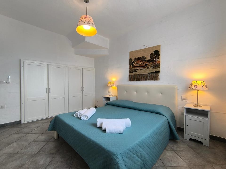 Bed, Bedroom, towels, wardrobe, air conditioner