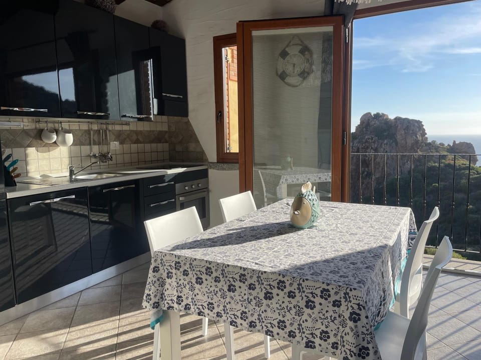 View (from property/room), Balcony/Terrace, Living room, Seating area, Dining area, Sea view