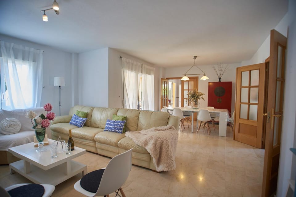 Property building, Living room, Seating area, Dining area, air conditioner