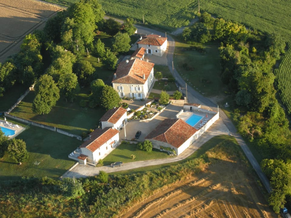 Property building, Natural landscape, Bird's eye view, Pool view, Street view, Swimming pool