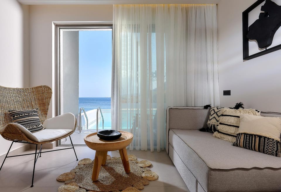 Living room, Seating area, Pool view, Sea view, Swimming pool