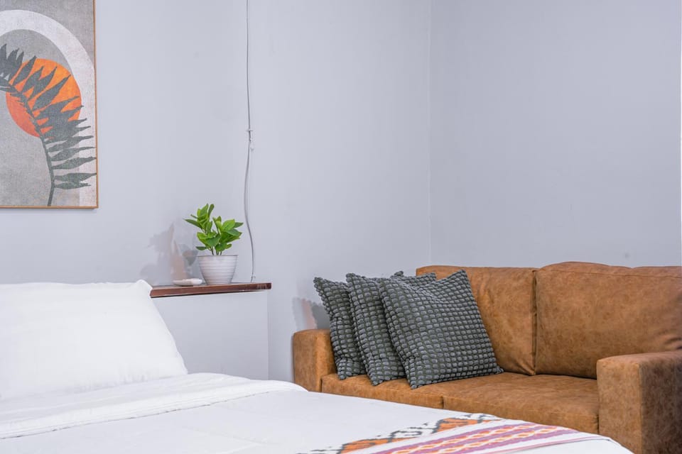 Bed, Seating area, Bedroom