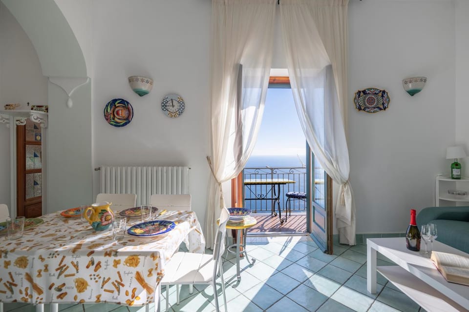 Natural landscape, View (from property/room), Balcony/Terrace, Living room, Seating area, Dining area, Sea view, internet