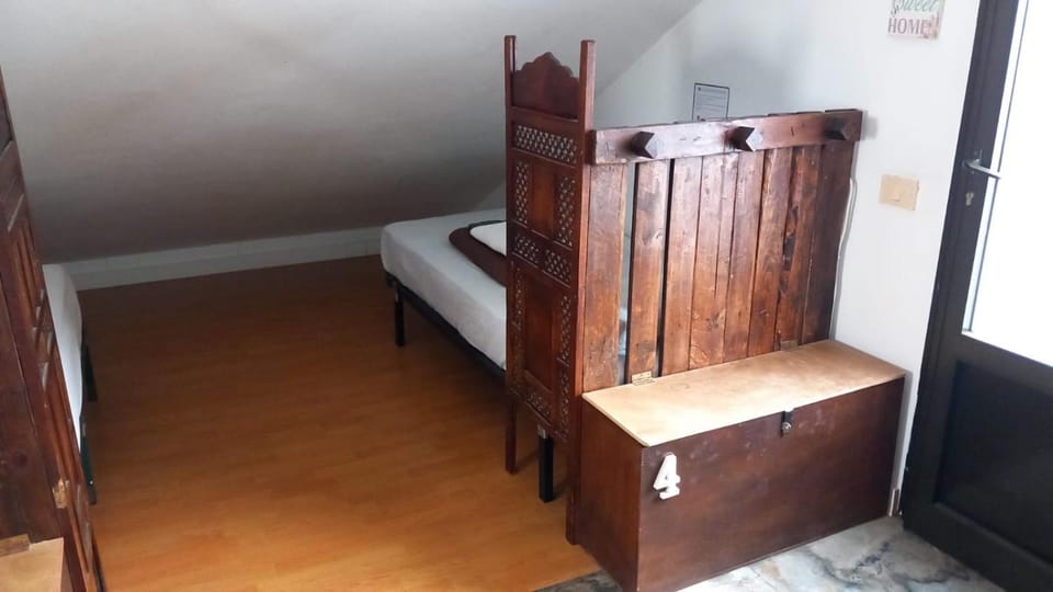 Bed, microwave, towels