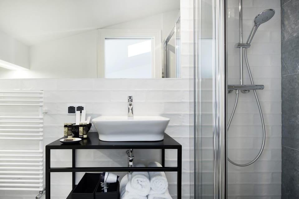Shower, Bathroom, hair dryier, towels
