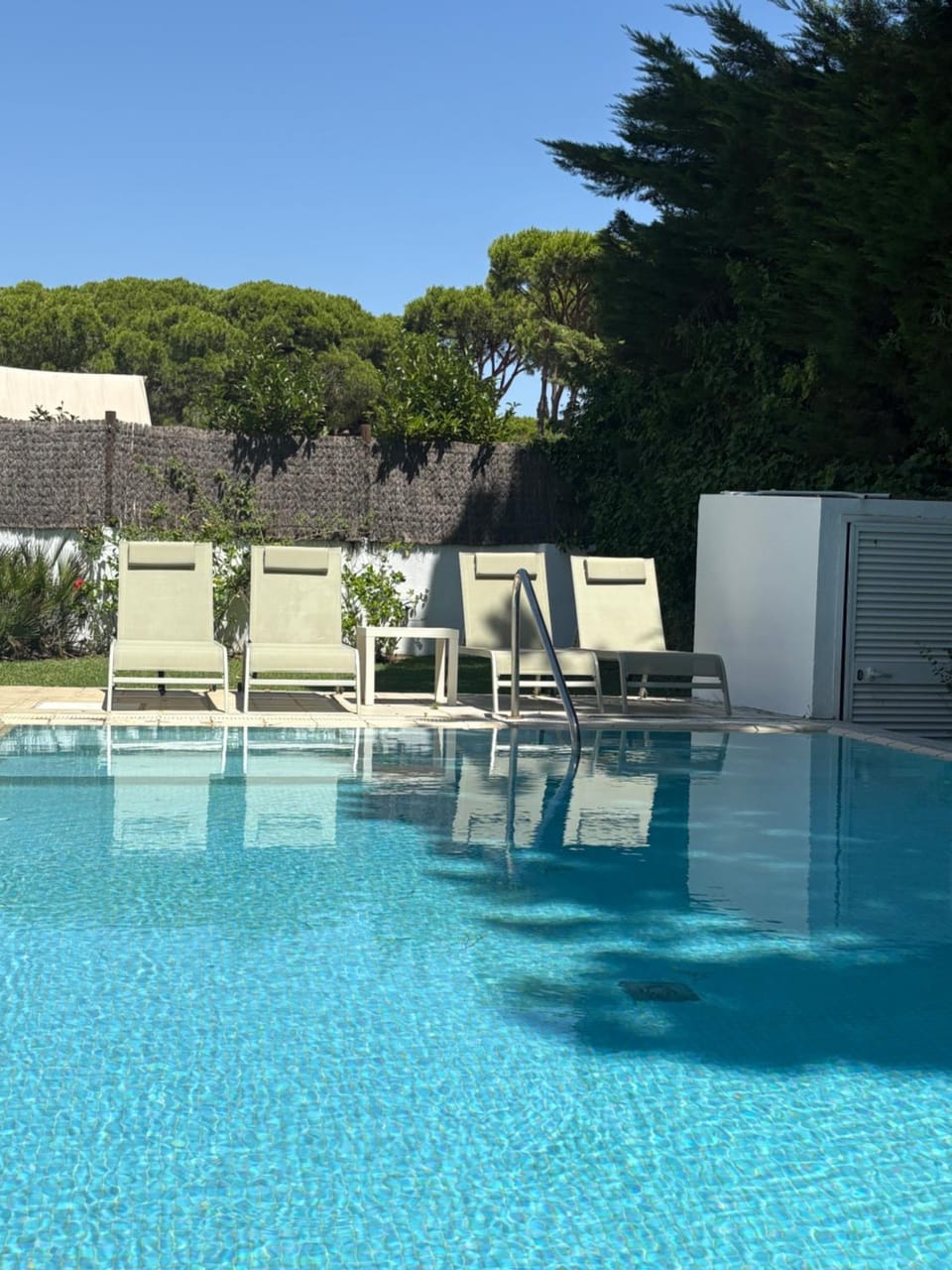 Swimming pool, sunbed