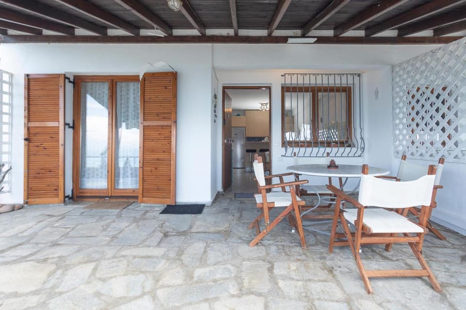 Property building, Patio, Day, Seating area, Dining area