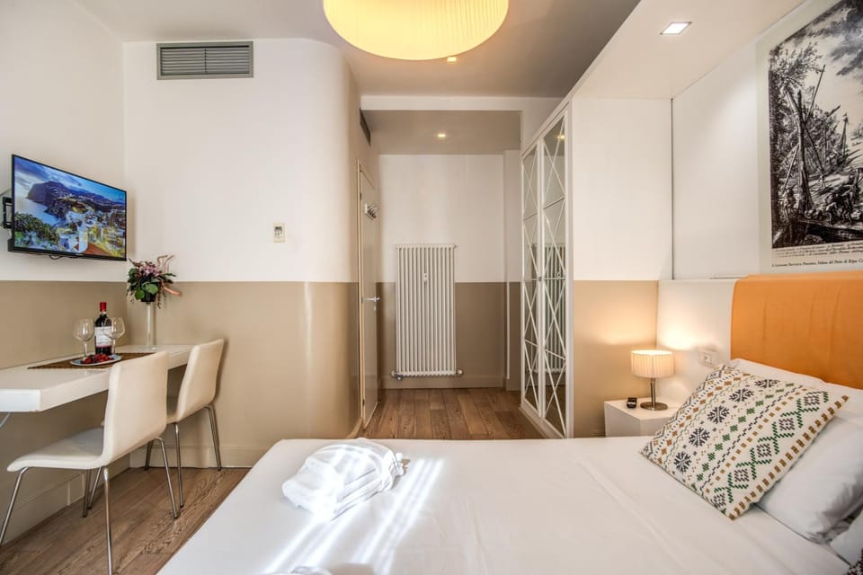 Bed, TV and multimedia, Decorative detail, microwave, wardrobe, air conditioner