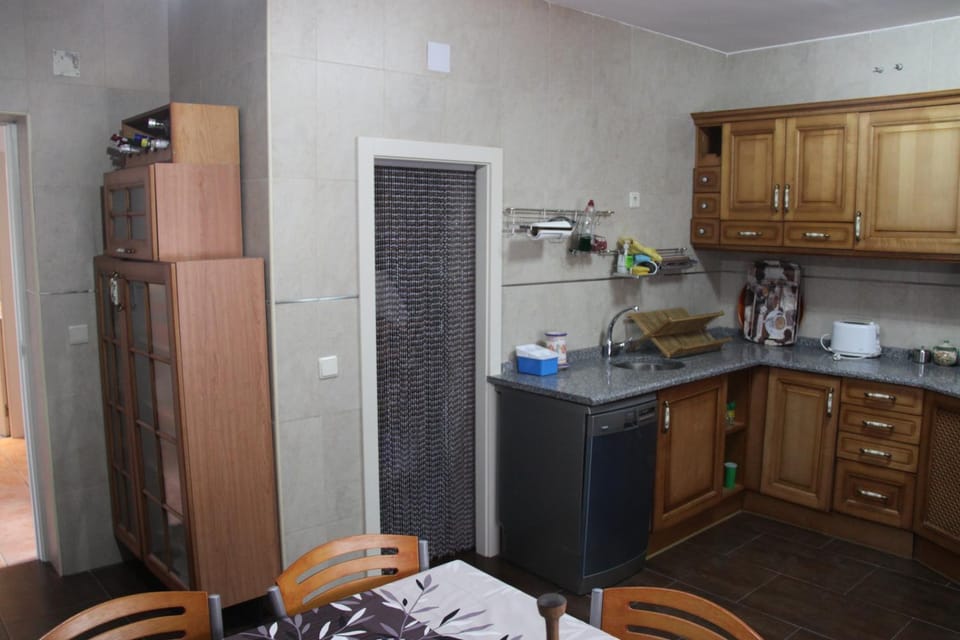 Kitchen or kitchenette, dishwasher, laundry