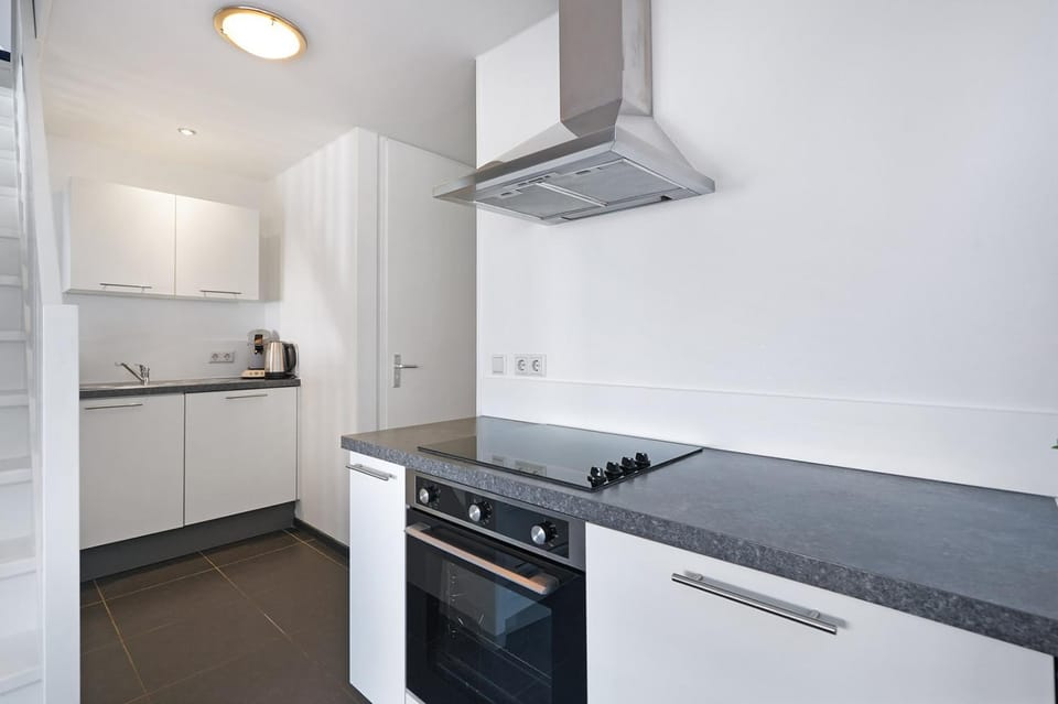 Kitchen or kitchenette, oven