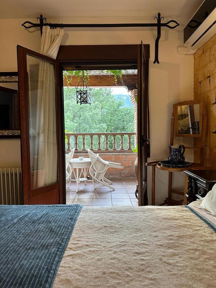 Bed, Natural landscape, View (from property/room), air conditioner