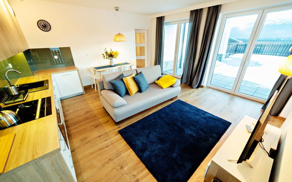 TV and multimedia, Kitchen or kitchenette, Living room, Seating area, Dining area
