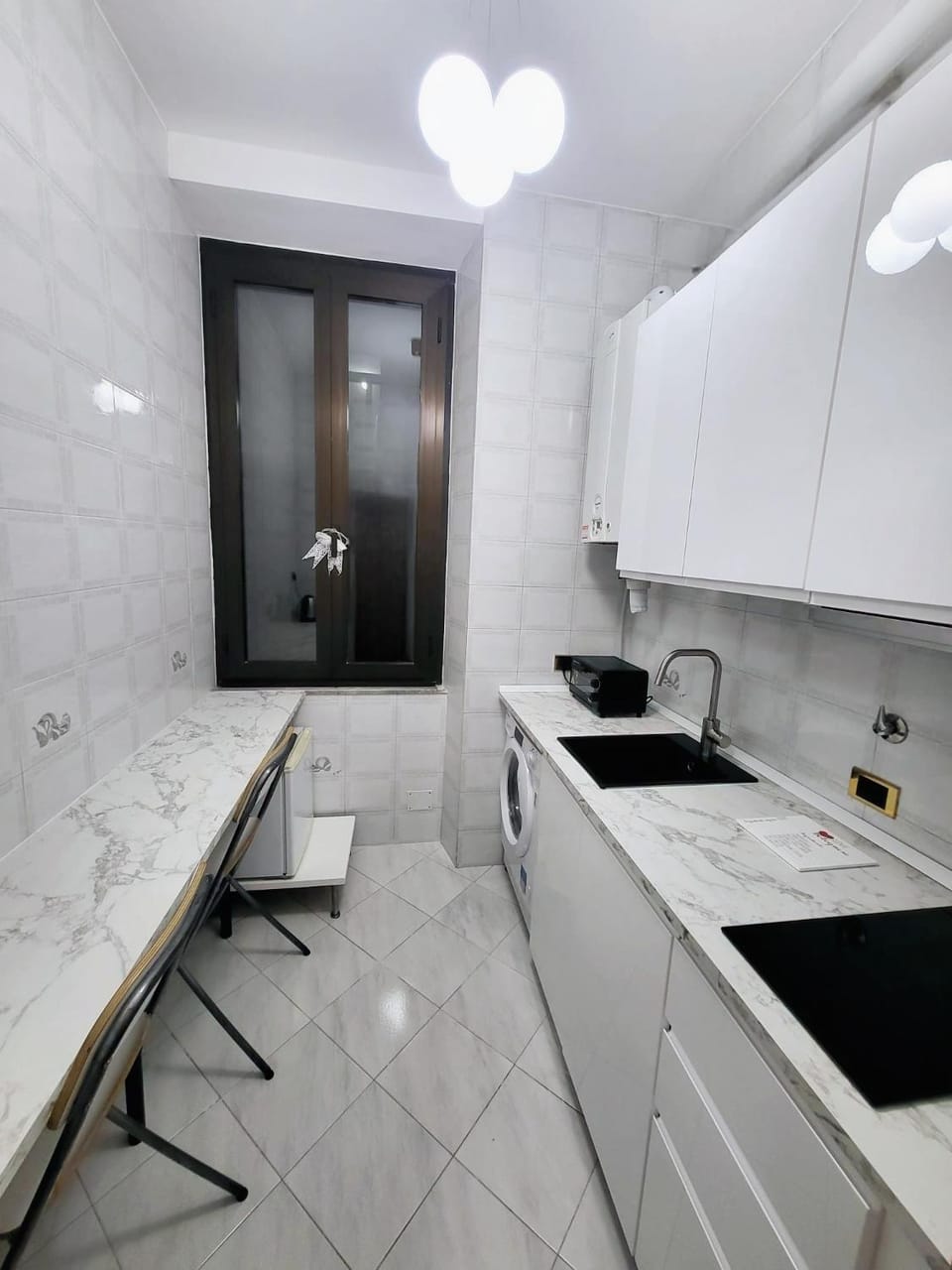 Kitchen or kitchenette, stove