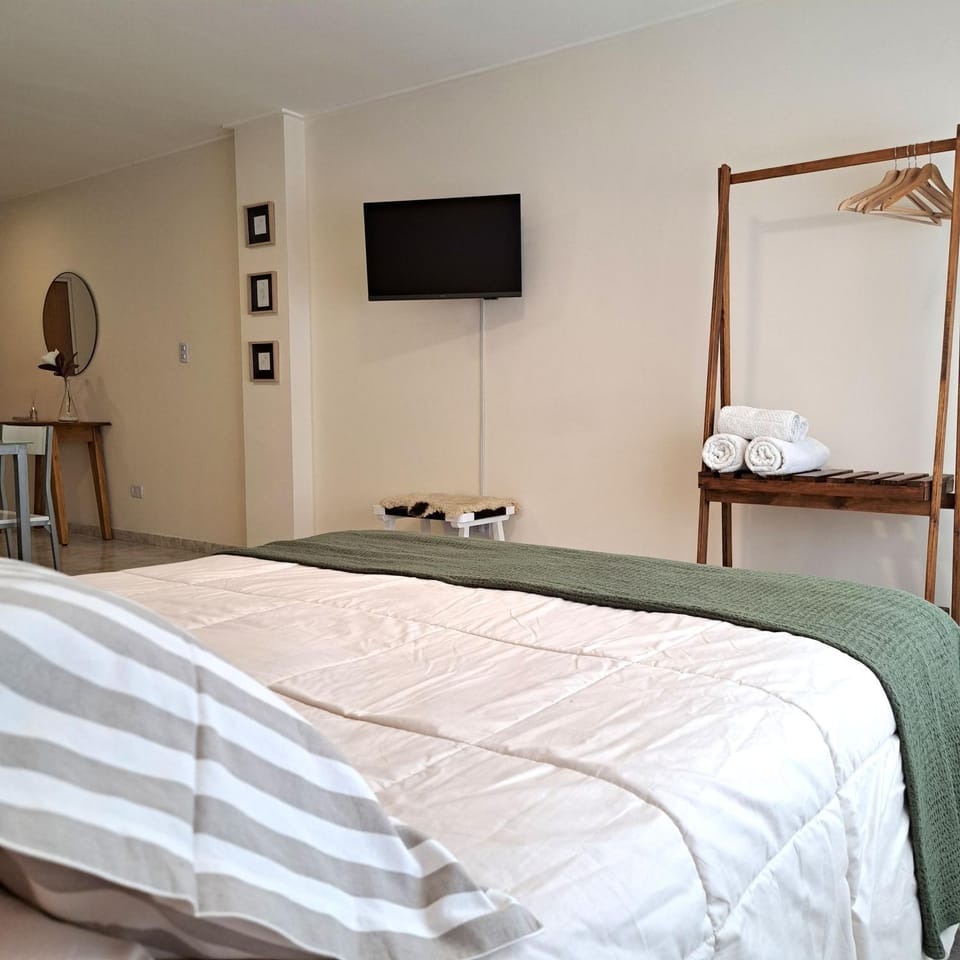 Bed, TV and multimedia, towels, wardrobe
