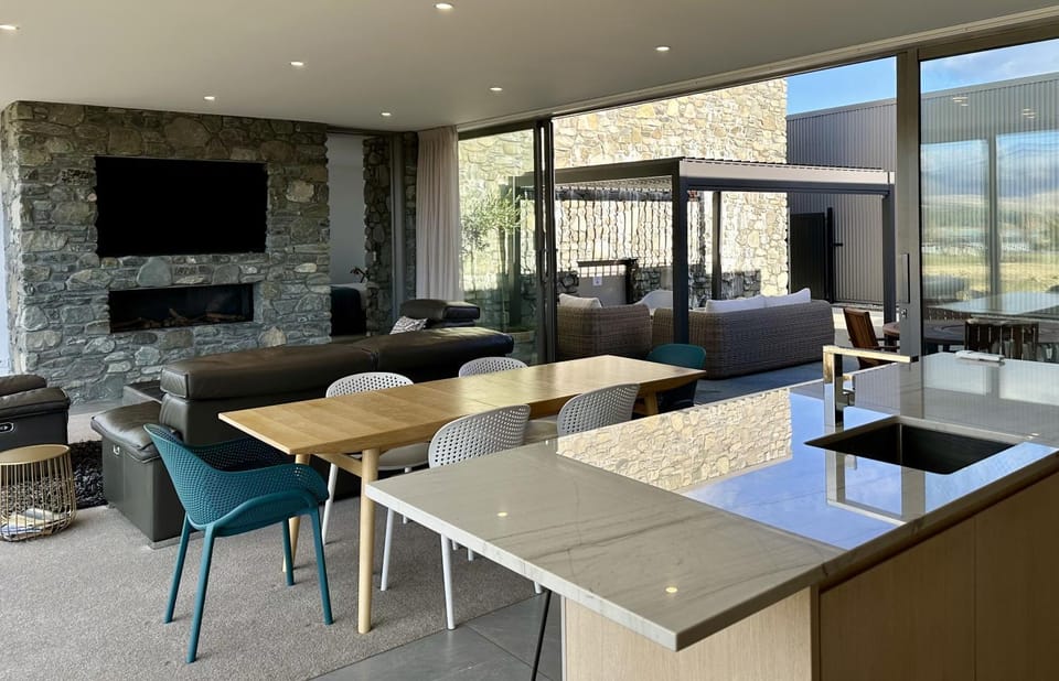 Living room, Dining area, Inner courtyard view, fireplace, kitchen