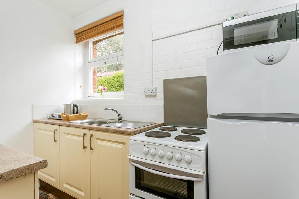 Kitchen or kitchenette, oven, stove, toaster