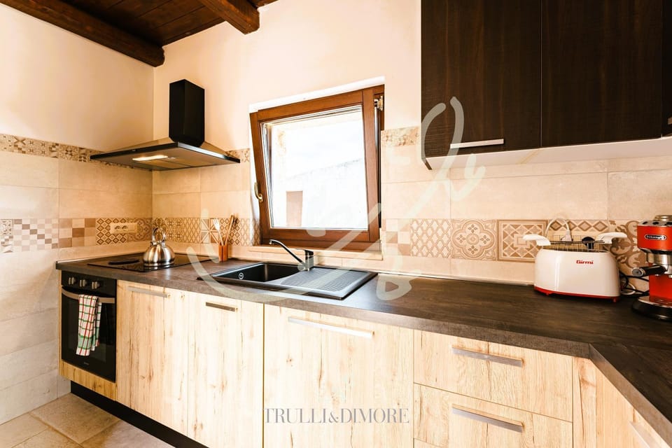 TD Truly Trulli Gentle Breezes Across Olive Valley House in Apulia