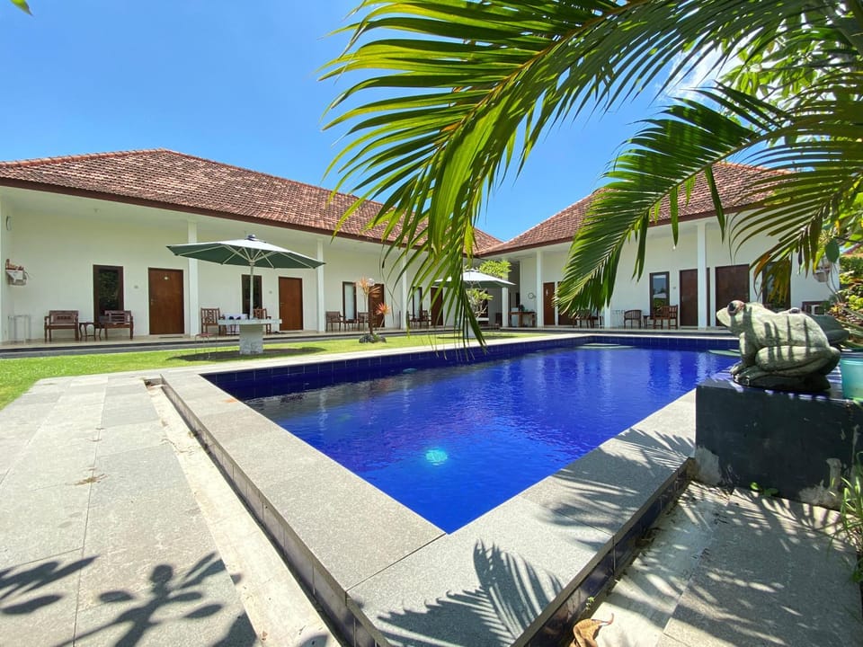 Property building, Day, Pool view, sunbed