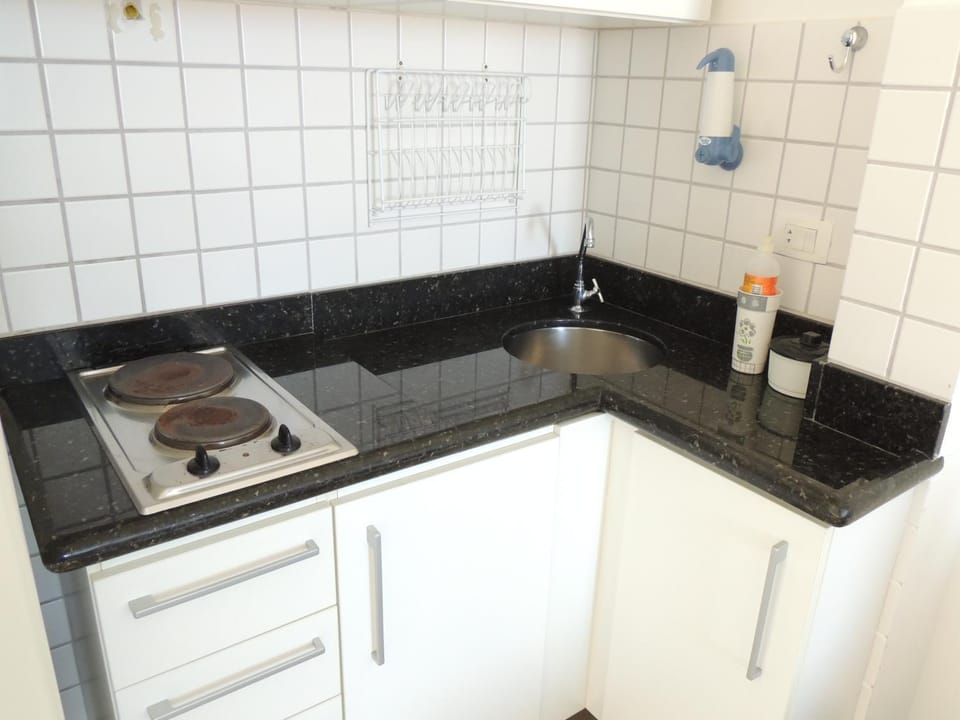 Kitchen or kitchenette, stove, kitchen