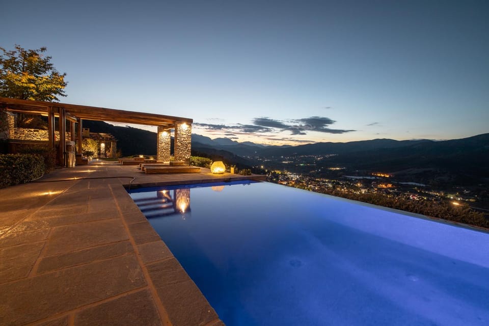 Property building, Night, Natural landscape, Mountain view, Pool view, Swimming pool