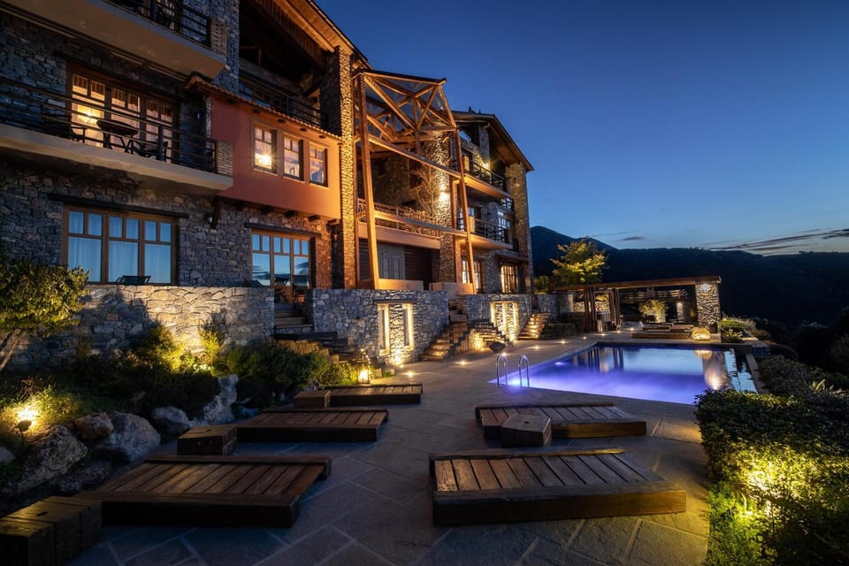 Property building, Patio, Night, Natural landscape, View (from property/room), Balcony/Terrace, Mountain view, Pool view, Swimming pool, sunbed