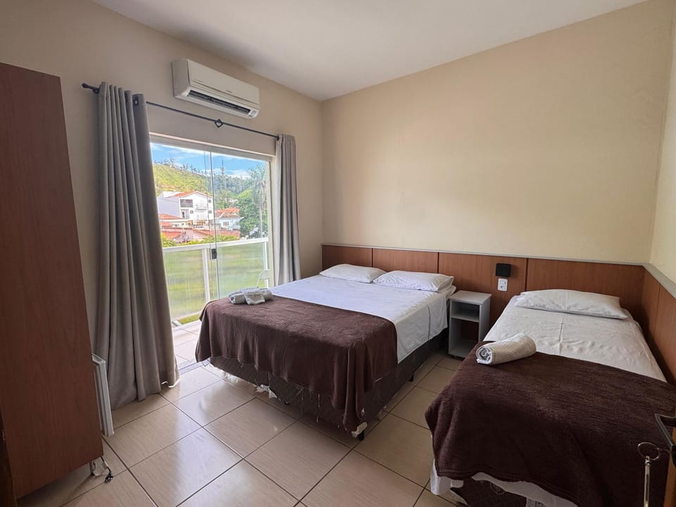 Bed, Photo of the whole room, Bedroom, towels, air conditioner