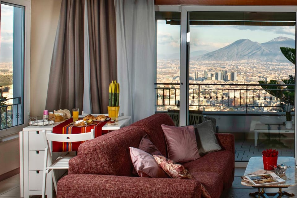 View (from property/room), Balcony/Terrace, Living room, Seating area, Dining area, Food